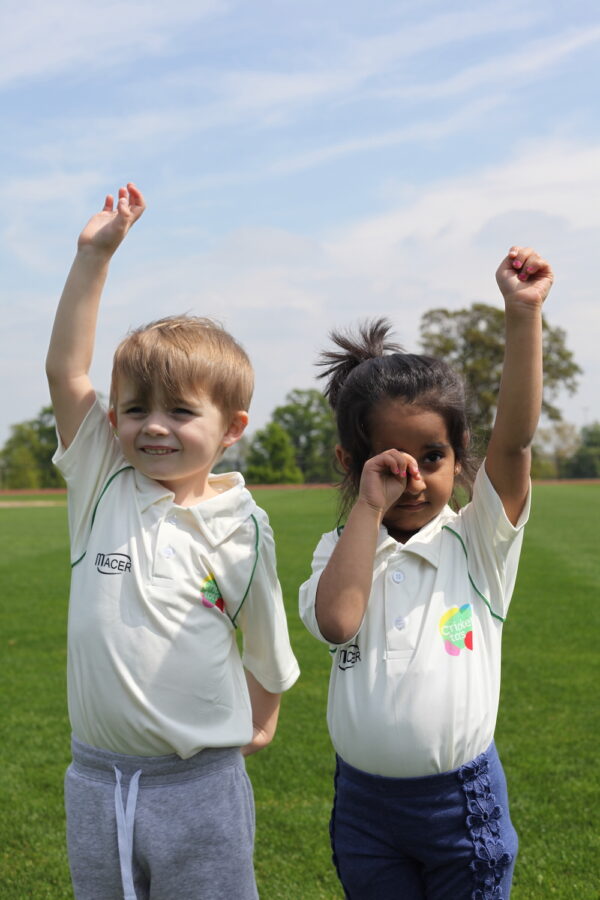 young boy and girl wearing white cricket tots t-shirt
