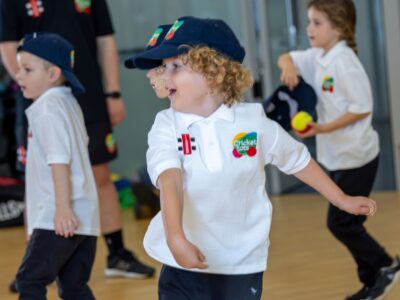 Group of preschool children taking part in a Cricket tots class